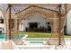 Beautiful backyard with manicured lawn, sparkling pool, and ample space for outdoor activities and relaxation at 6114 E Calle Del Norte --, Scottsdale, AZ 85251
