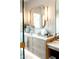 Bathroom vanity featuring double mirrors, lights, and modern fixtures at 6114 E Calle Del Norte --, Scottsdale, AZ 85251