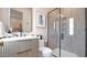 Modern bathroom with stylish vanity, framed mirror, and glass-enclosed shower at 6114 E Calle Del Norte --, Scottsdale, AZ 85251