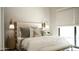 Serene main bedroom with a plush bed, stylish decor, and ample natural light creating a relaxing retreat at 6114 E Calle Del Norte --, Scottsdale, AZ 85251