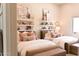 Bedroom features two beds adorned with decorative shelves and charming decor accents at 6114 E Calle Del Norte --, Scottsdale, AZ 85251