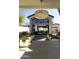 Charming exterior view with modern design, large windows, and landscaped yard at 6114 E Calle Del Norte --, Scottsdale, AZ 85251