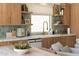 Elegant kitchen with stylish cabinetry, modern appliances, and stunning backsplash, perfect for cooking enthusiasts at 6114 E Calle Del Norte --, Scottsdale, AZ 85251