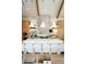 Bright kitchen with island seating, modern range hood, and stylish pendant lighting at 6114 E Calle Del Norte --, Scottsdale, AZ 85251