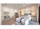 Bright main bedroom featuring a canopy bed, sitting area, and natural light at 6114 E Calle Del Norte --, Scottsdale, AZ 85251