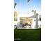 Modern outdoor kitchen with stainless steel appliances, a spacious dining area, and backyard views at 6114 E Calle Del Norte --, Scottsdale, AZ 85251