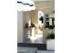 Modern outdoor kitchen with a built-in grill, ample counter space, and stylish lighting for evening gatherings at 6114 E Calle Del Norte --, Scottsdale, AZ 85251
