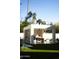 Outdoor kitchen perfect for entertaining, with a dining area and ample counter space, overlooking the pool at 6114 E Calle Del Norte --, Scottsdale, AZ 85251