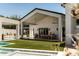 Expansive covered patio perfect for outdoor dining and entertaining, overlooking the well manicured backyard at 6114 E Calle Del Norte --, Scottsdale, AZ 85251