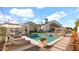 Expansive backyard pool with sun loungers and umbrella, ideal for outdoor relaxation at 6114 E Calle Del Norte --, Scottsdale, AZ 85251