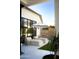 Inviting poolside lounge area with comfortable seating, umbrella, and modern design at 6114 E Calle Del Norte --, Scottsdale, AZ 85251