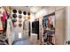 Bright and spacious walk-in closet with hats on display, ample storage, and decorative touches at 6114 E Calle Del Norte --, Scottsdale, AZ 85251