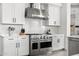 Close-up of a kitchen featuring stainless steel appliances and white cabinets at 6212 E Lonesome Trl, Cave Creek, AZ 85331