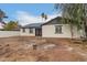 Backyard featuring an bright home exterior, dual doors, and shaded privacy at 6812 S 41St Pl, Phoenix, AZ 85042