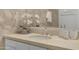 A bathroom vanity with an off-white countertop and a vessel sink at 7121 E Rancho Vista Dr # 3001, Scottsdale, AZ 85251