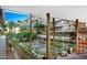 Serene courtyard featuring a fountain, landscaping, and a view of the modern building design at 7121 E Rancho Vista Dr # 3001, Scottsdale, AZ 85251