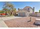 Single Gathering home with desert landscaping and spacious driveway at 9211 W Charleston Ave, Peoria, AZ 85382