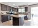 Kitchen with tile flooring and granite countertops with stainless steel appliances at 9211 W Charleston Ave, Peoria, AZ 85382