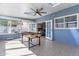 Bright sun room featuring a ceiling fan, skylights and a foosball table at 9211 W Charleston Ave, Peoria, AZ 85382