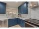 Close up of kitchen area with updated appliances and a modern look at 9627 W Reno View Dr, Peoria, AZ 85345