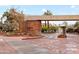 Community entrance with brick signage and flowerbeds, providing a welcoming and attractive first impression at 101 N 7Th St # 137, Phoenix, AZ 85034