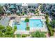 Beautiful aerial view of community pool with surrounding buildings at 101 N 7Th St # 137, Phoenix, AZ 85034
