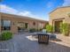 Inviting backyard patio with lounging furniture, and desert views at 10829 E Volterra Ct, Scottsdale, AZ 85262