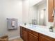 Bathroom boasts a vanity with storage, a well-lit mirror, and a calming color scheme for a relaxing space at 10829 E Volterra Ct, Scottsdale, AZ 85262