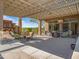 Spacious outdoor patio includes a covered seating area, grill, and an outdoor dining area at 10829 E Volterra Ct, Scottsdale, AZ 85262