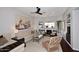 Bright and airy living room featuring a fireplace, neutral tones, and comfortable seating arrangements at 10960 N 78 St, Scottsdale, AZ 85260