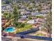 An aerial view captures the essence of suburban living with a glimpse of the community pool at 1205 W El Prado Rd, Chandler, AZ 85224