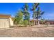 Backyard featuring a gazebo, landscaping, and natural rock ground cover at 1205 W El Prado Rd, Chandler, AZ 85224