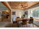 Inviting dining area with wooden table, chairs, and a window seat, creating a cozy space at 1205 W El Prado Rd, Chandler, AZ 85224