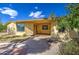 Exterior backyard featuring a covered patio and landscaping at 1205 W El Prado Rd, Chandler, AZ 85224