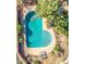 An inviting backyard pool offers a refreshing escape and features mature landscaping at 1205 W El Prado Rd, Chandler, AZ 85224