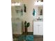 Bathroom features a marble countertop, a vanity with plenty of storage space, and a plant at 13216 S 175 Dr, Goodyear, AZ 85338