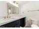 Charming bathroom features a modern sink vanity with plenty of counter space and brushed gold hardware at 13244 N 54Th Dr, Glendale, AZ 85304