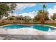 Inviting backyard pool with surrounding landscaping and privacy fence creates a relaxing outdoor oasis at 13244 N 54Th Dr, Glendale, AZ 85304