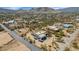 Captivating aerial shot of a home with a horse area and a convenient two-car garage at 1345 E Gaffney Rd, New River, AZ 85087