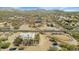 Expansive aerial view of the desert property and surrounding landscape, showcasing the neighborhood at 1345 E Gaffney Rd, New River, AZ 85087