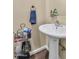 Small bathroom featuring white pedestal sink and modern fixtures at 1345 E Gaffney Rd, New River, AZ 85087