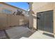 Private backyard patio with concrete and desert rock landscaping at 13824 S 41St Way, Phoenix, AZ 85044