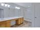 Bright bathroom featuring a double sink vanity and separate shower at 13824 S 41St Way, Phoenix, AZ 85044