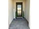 Inviting front entrance featuring a decorative welcome mat and stylish black framed glass door at 1511 E Lynx Way, Gilbert, AZ 85298