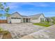 Beautiful home featuring a paver driveway, a spacious 3-car garage and attractive landscaping at 1547 E Crescent Way, Gilbert, AZ 85298