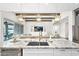 Beautiful kitchen island featuring granite countertops, double sinks, and pendant lighting at 1547 E Crescent Way, Gilbert, AZ 85298