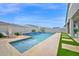 Inviting pool featuring fountains, a tiled border, travertine pavers, and lounge seating at 1547 E Crescent Way, Gilbert, AZ 85298