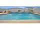 Relaxing backyard pool with fountains and landscaping, perfect for outdoor entertaining and enjoying sunny days at 1547 E Crescent Way, Gilbert, AZ 85298