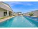 Backyard view of pool and bar with built in seating areas at 1547 E Crescent Way, Gilbert, AZ 85298