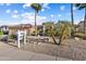 Lovely home featuring desert landscaping, palm trees, and a 'coming soon' sign in the front yard at 16253 W Windcrest Dr, Surprise, AZ 85374